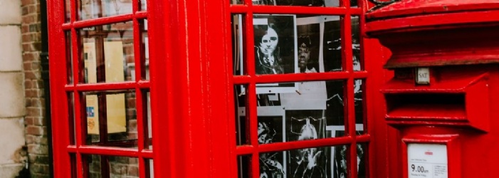 Post box and telephone box with images in as part of the Sidmouth College art CODEX project